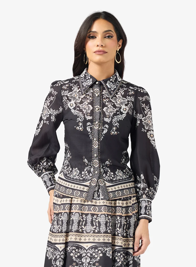 خزانة طقم بلوزة وتنورة مطبوعة