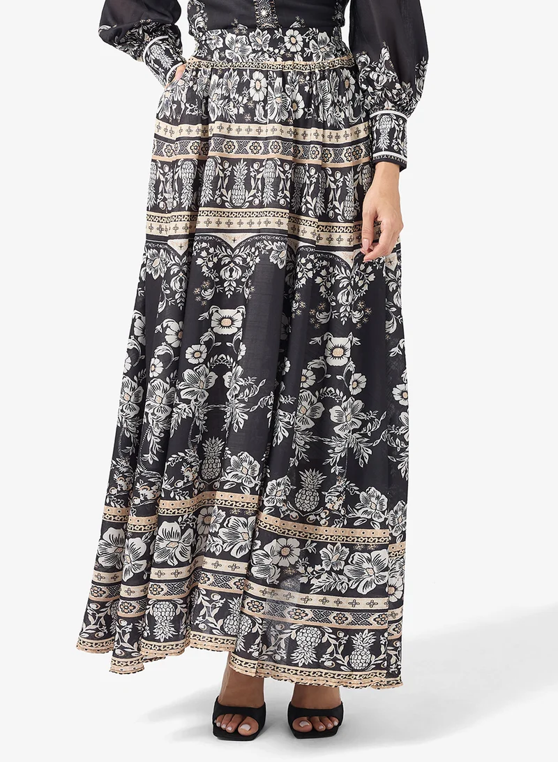 خزانة طقم بلوزة وتنورة مطبوعة