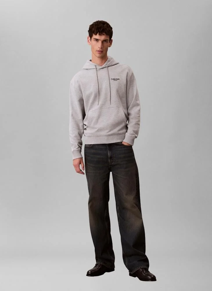 Calvin Klein Jeans  Logo Back Print Hoodie for Men | Best Price UAE