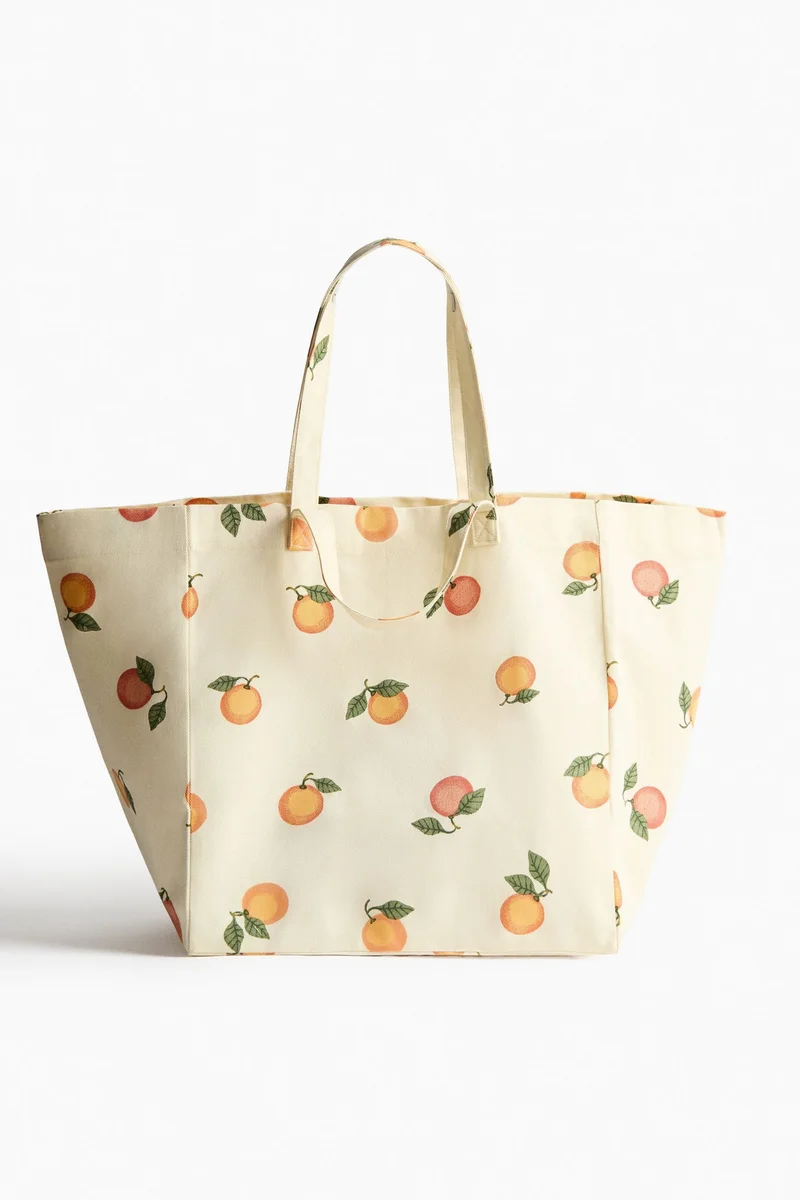 اتش اند ام حقيبة شاطئ مزينة بنقوش