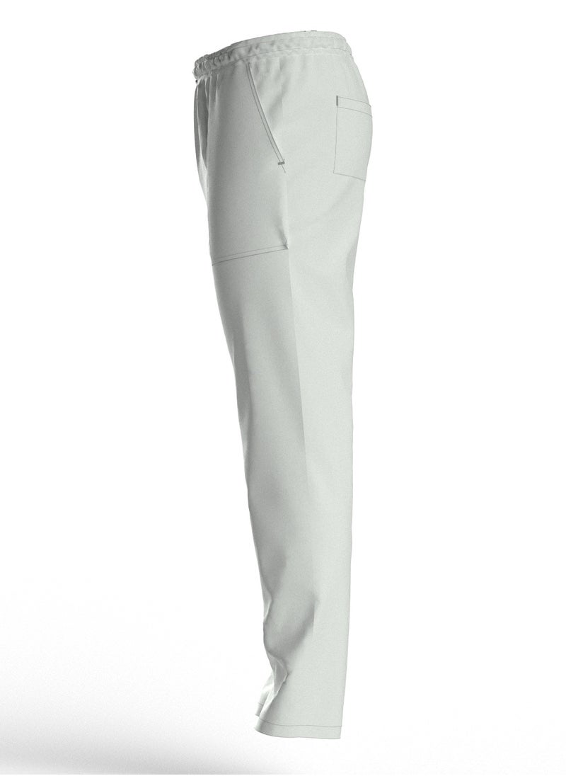 Doctor - Scrub Comfortable white Lycra fabric with many pockets is meticulously crafted to retain its color without fading with repeated washing - Image 1