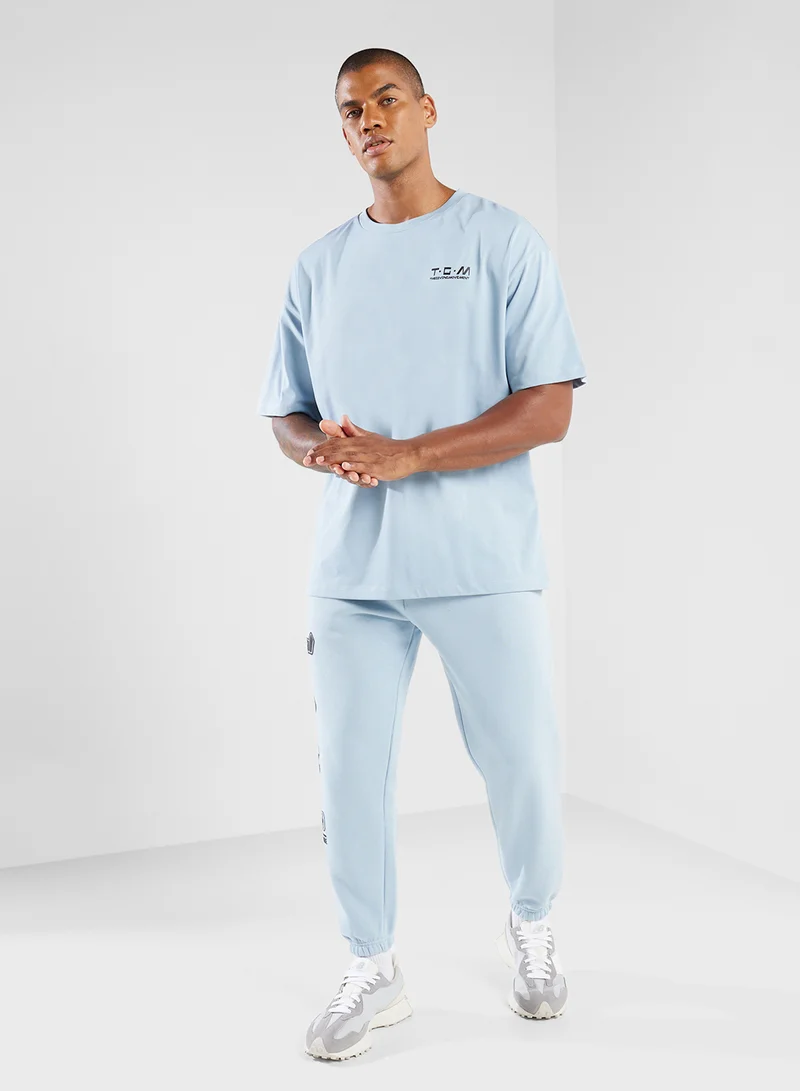 ذا جيفينج موفمنت Oversized Racing Printed T-Shirt