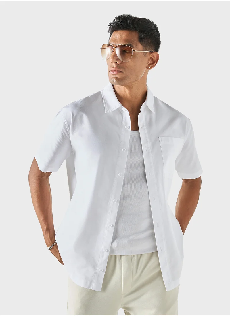 ايكونيك Iconic Solid Shirt with Short Sleeves and Pocket