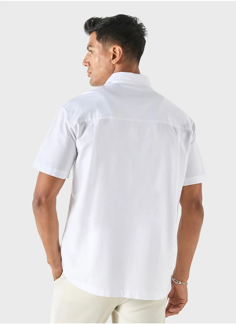 ايكونيك Iconic Solid Shirt with Short Sleeves and Pocket