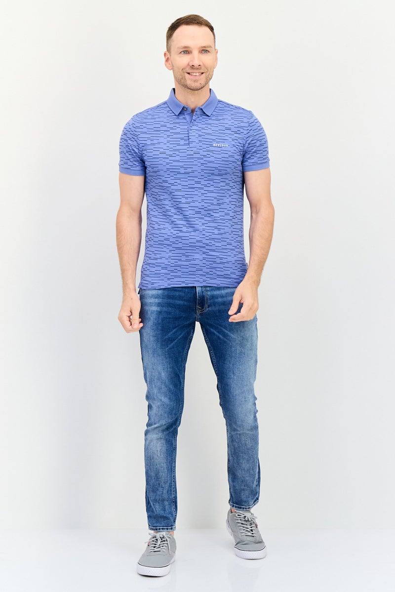 Levi's قميص بولو بأكمام قصيرة من ليفيس × ريدلوب للرجال بتصميم عادي وطباعة شاملة، متعدد الألوان - Image 4