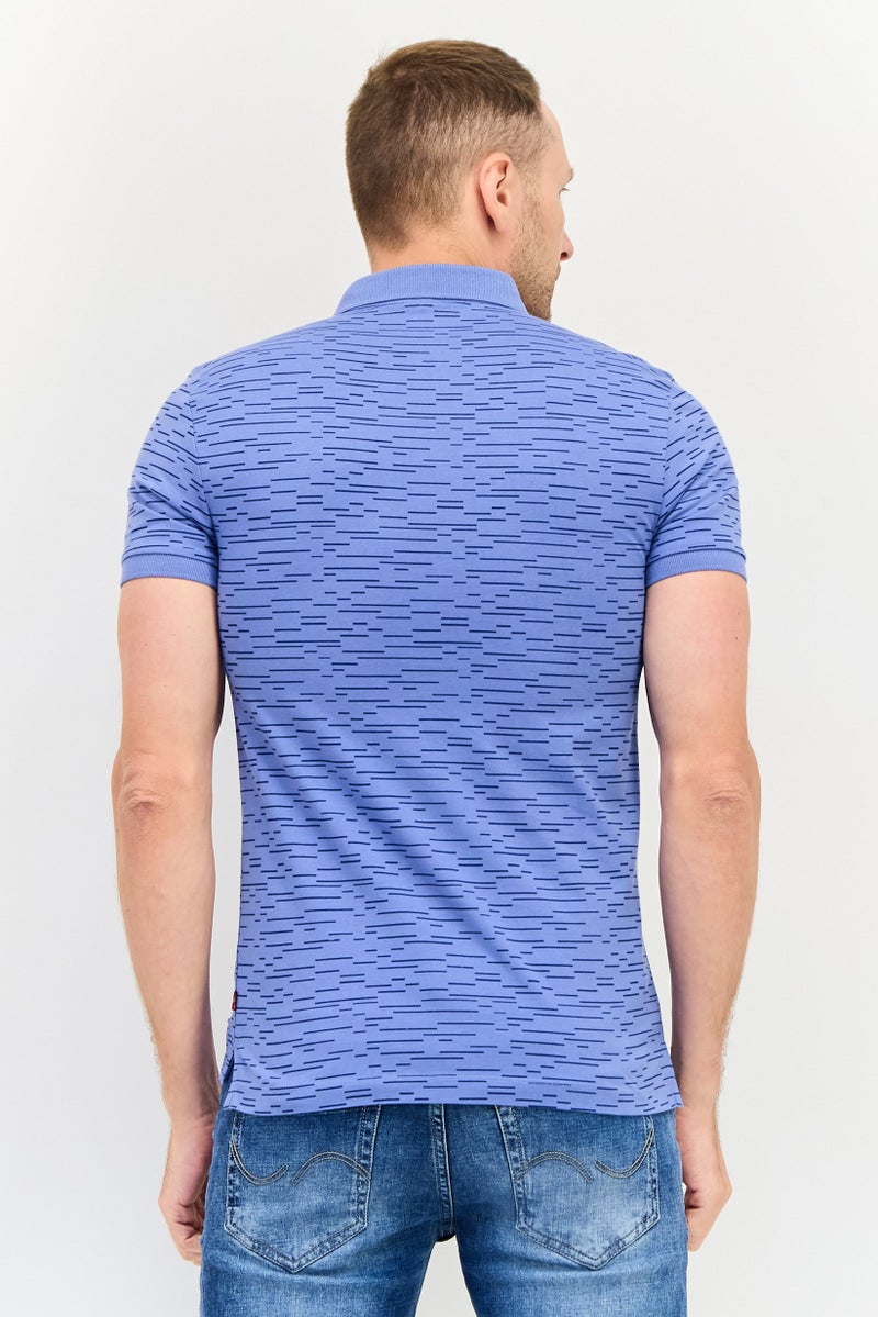 Levi's قميص بولو بأكمام قصيرة من ليفيس × ريدلوب للرجال بتصميم عادي وطباعة شاملة، متعدد الألوان - Image 3