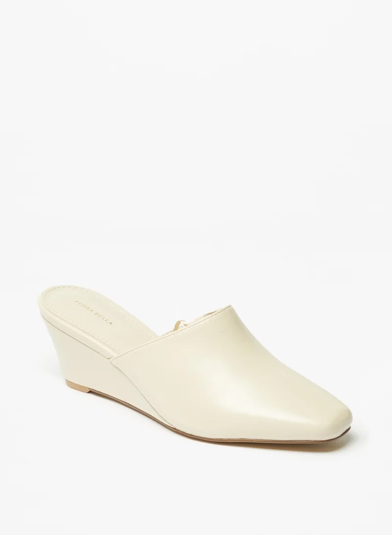 فلورا بيلا من شو إكسبرس Womens Solid Slip-On Mules with Wedge Heels
