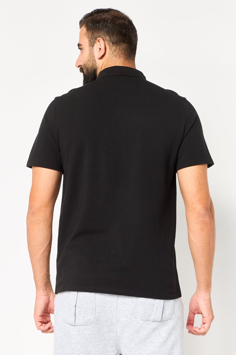 PUMA تي شيرت بولو كرة القدم للرجال بأكمام قصيرة، أسود - Image 4