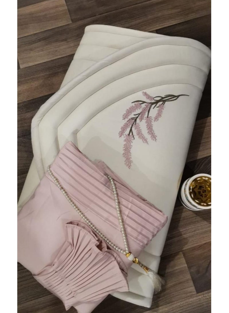 A distinctive and wonderful prayer set consisting of (a prayer rug embroidered with a lavender design and lined, a prayer dress with wonderful pleats, and a beaded rosary) 