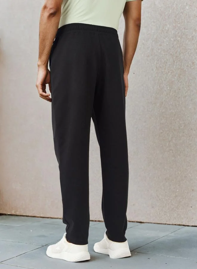 Splash Active  Embossed Logo Track Pants with Pockets for Men | Best Price UAE