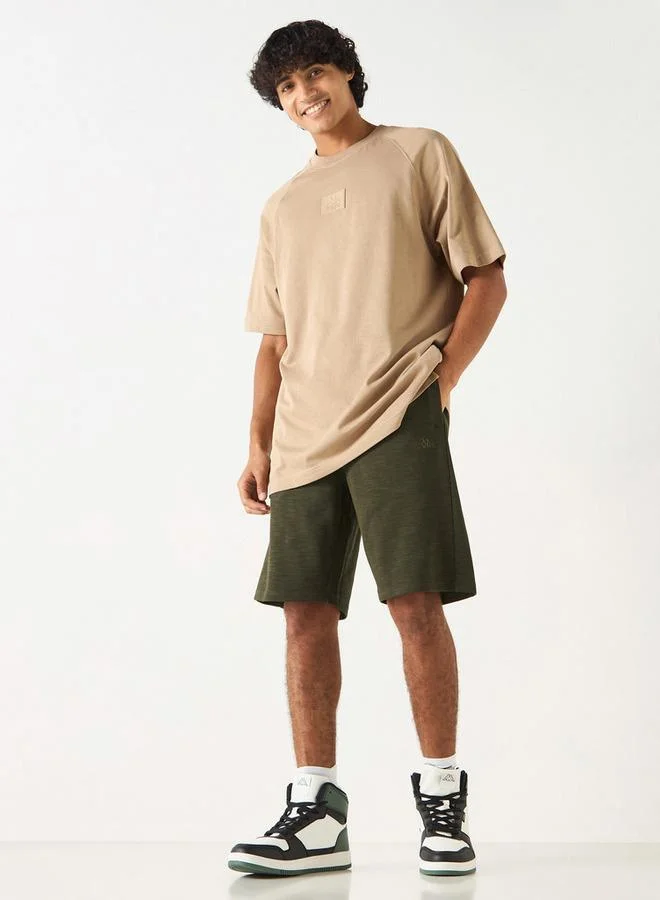 كابا شورت بارز الملمس برباط إغلاق وجيوب من كابا