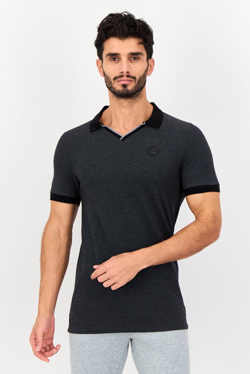 PUMA Men Sportswear Fit Short Sleeve Outdoor T Shirt, Black - Image 1