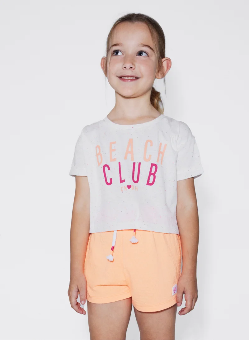 CANADA HOUSE Soft and Comfortable Beach Club Printed White T-shirt with Short Sleeves and Round Neckline for Girls