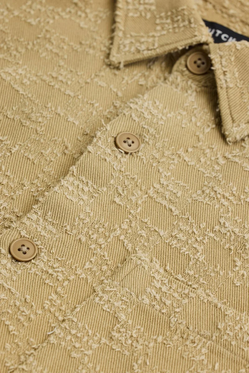 سنيتش قميص بيج بقصة مريحة وملمس مميز