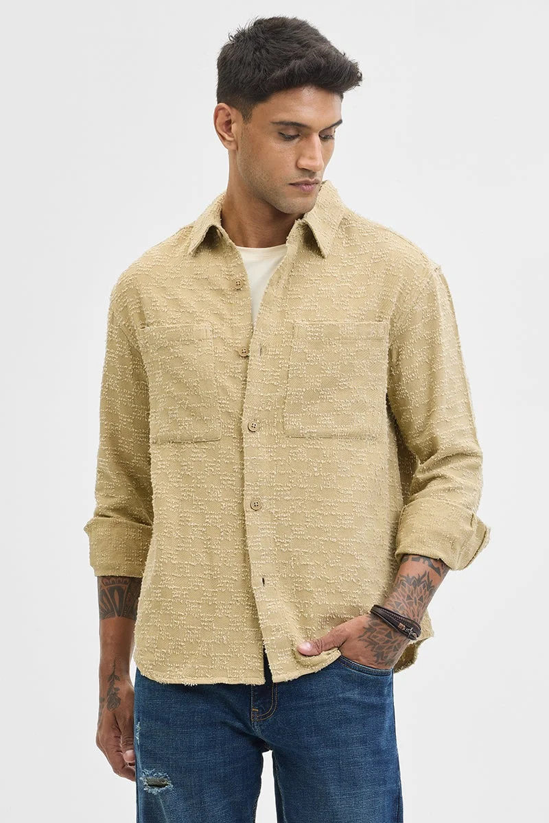 سنيتش قميص بيج بقصة مريحة وملمس مميز