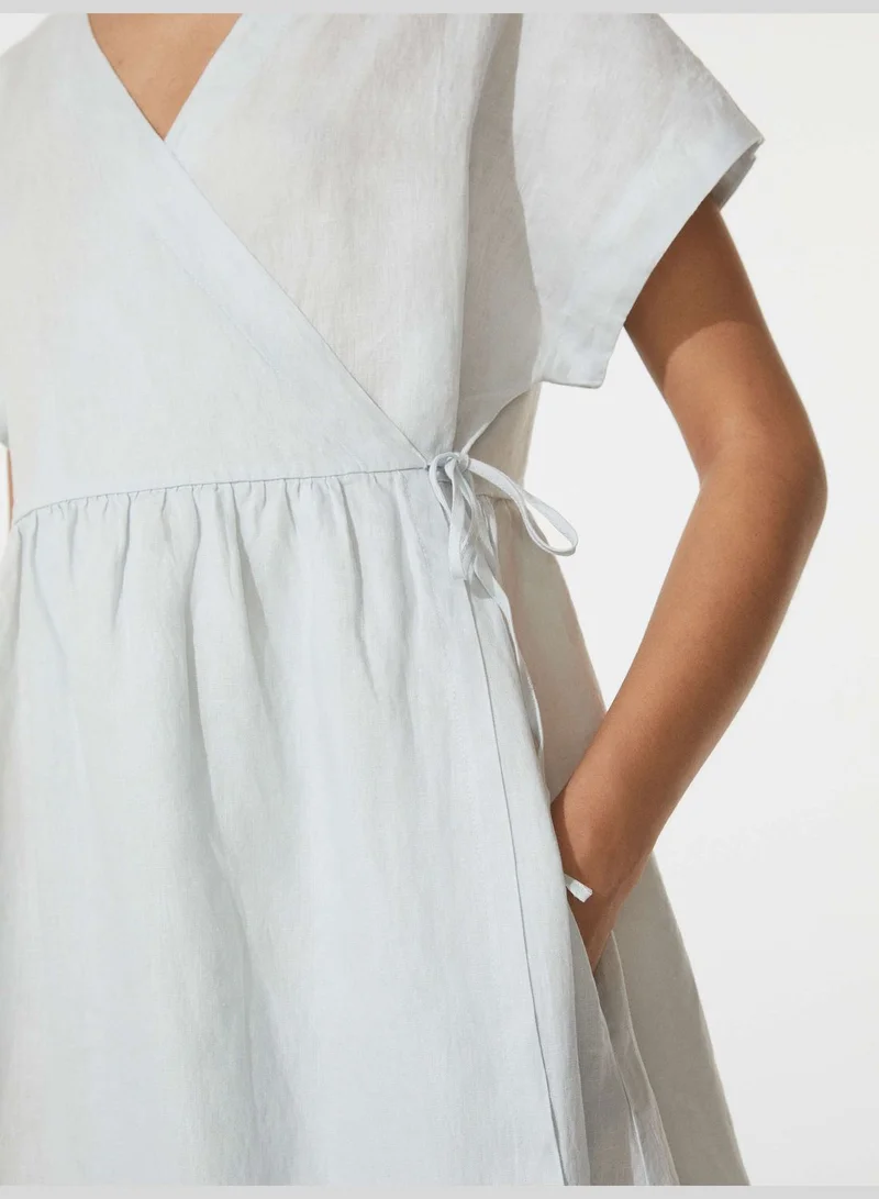 oysho 100% linen midi wrap dress for Women | Best Price UAE oysho 100% linen midi wrap dress for Women | Best Price UAE