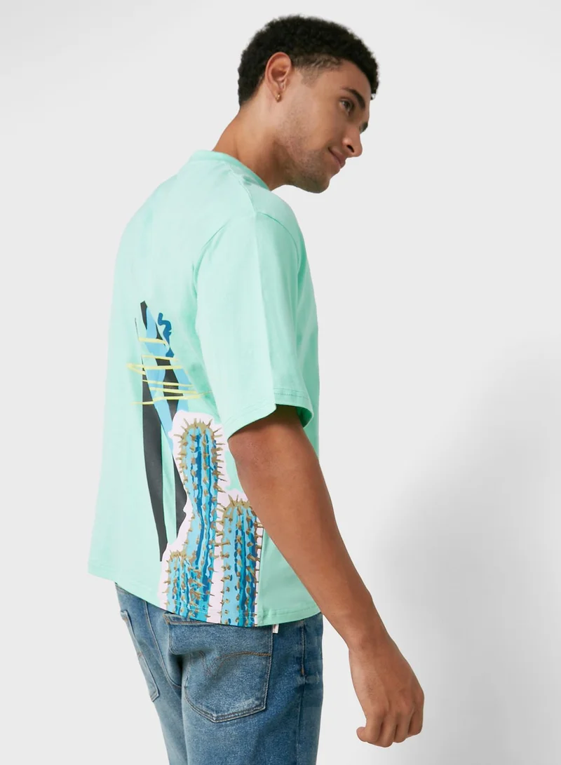 سفنتي فايف تيشيرت كبير الحجم مزين برسومات