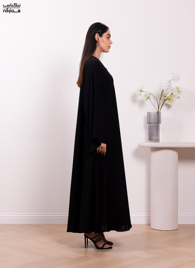 Nikias Classic plain Nida fabric abaya with full front button closure - Image 3