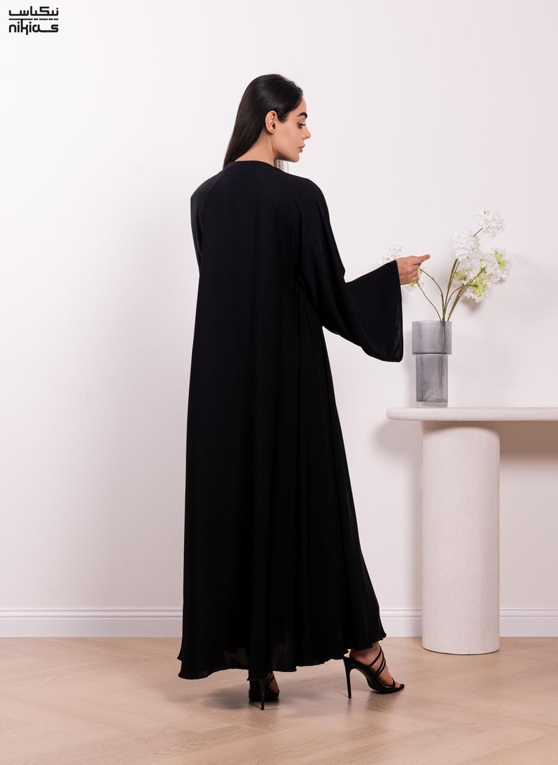 Nikias Classic plain Nida fabric abaya with full front button closure - Image 4
