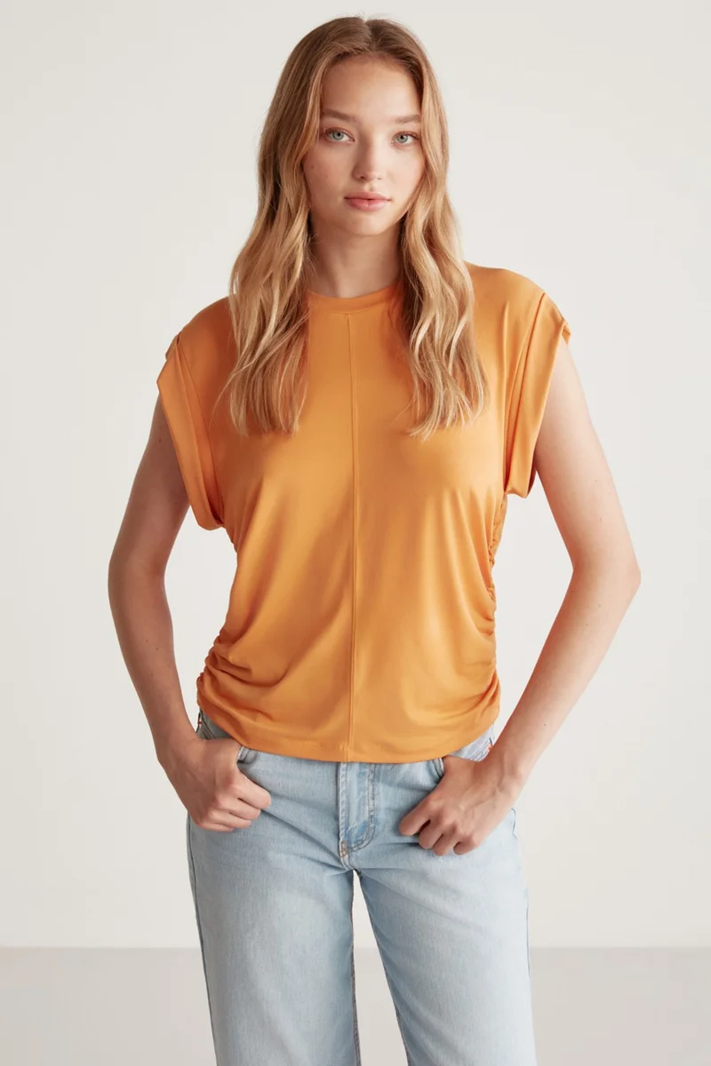 جريميلانج Roberta Women Sandy Flowy and Flexible Fabric Low Shoulder Sleeveless Oversize Orange Blouse