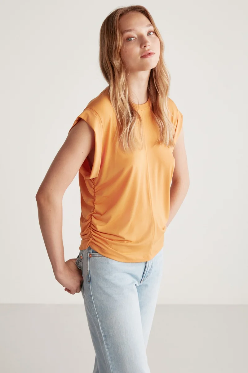 جريميلانج Roberta Women Sandy Flowy and Flexible Fabric Low Shoulder Sleeveless Oversize Orange Blouse