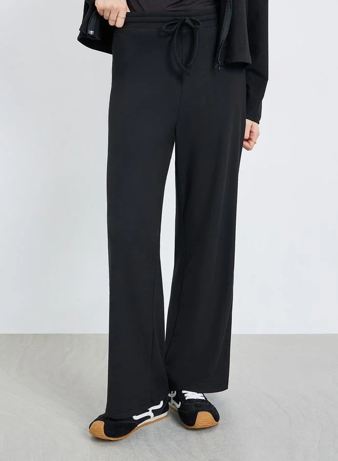 Styli  Women Black Zip-Up Knit Jacket and Pants Co-Ords for Women | Best Price UAE