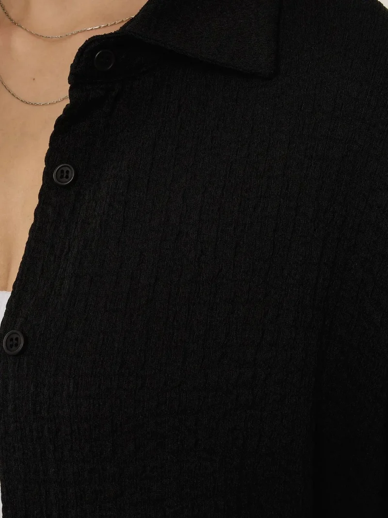 زوبعة قميص بأزرار كبير الحجم