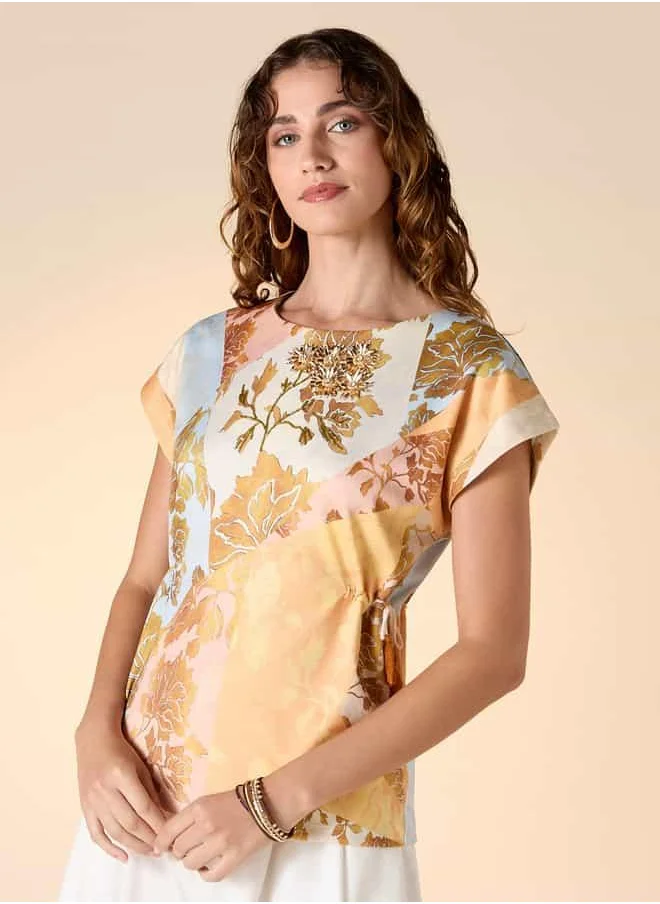 ايكونيك Iconic Floral Foil Print Top with Extended Sleeves and Side Tie Detail