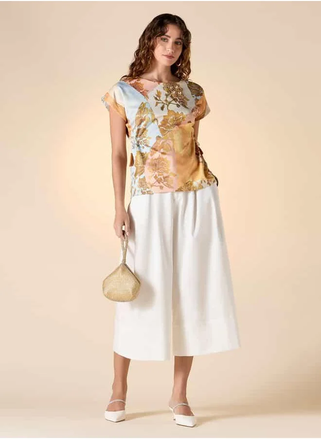 ايكونيك Iconic Floral Foil Print Top with Extended Sleeves and Side Tie Detail