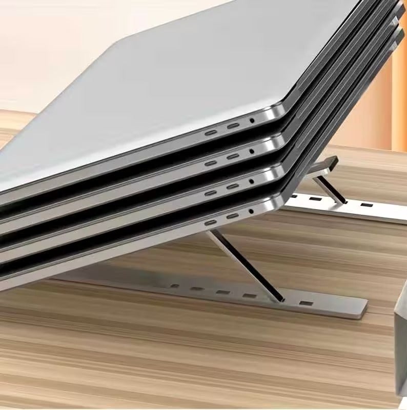 JESR AL AHLAM Adjustable Laptop Stand for Desk - Foldable & Portable Laptop Riser with Ventilated Cooling, Ergonomic Design for MacBook Pro/Air, Dell, HP, Sony, Notebooks - Lightweight, Durable & Space-Saving, Silver - Image 4