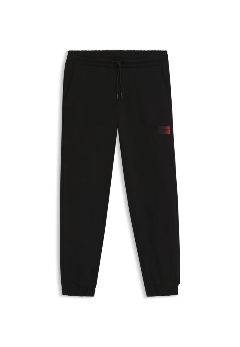HUGO Black Cotton-terry tracksuit bottoms with gradient logo for Men | Best Price UAE