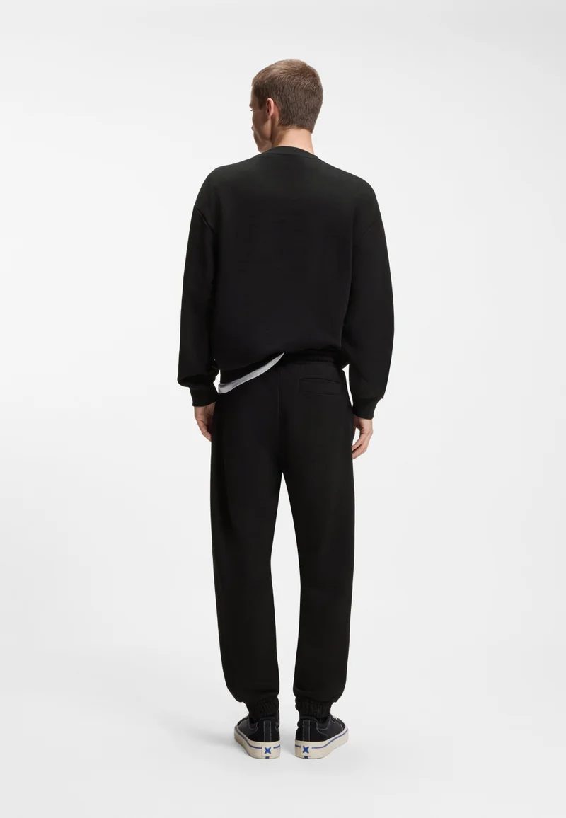 هوجو بنطال رياضي قطني تيري بشعار متدرج