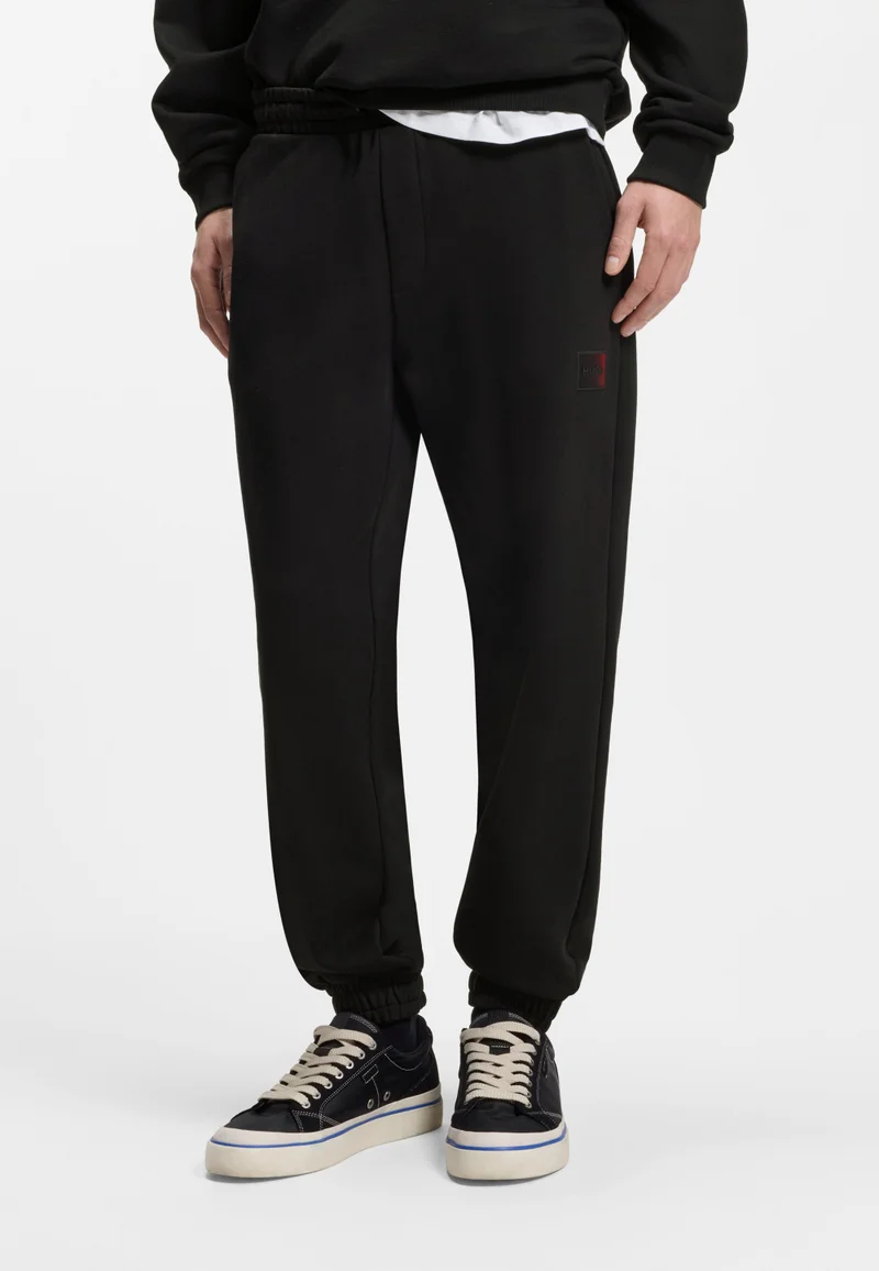 هوجو بنطال رياضي قطني تيري بشعار متدرج