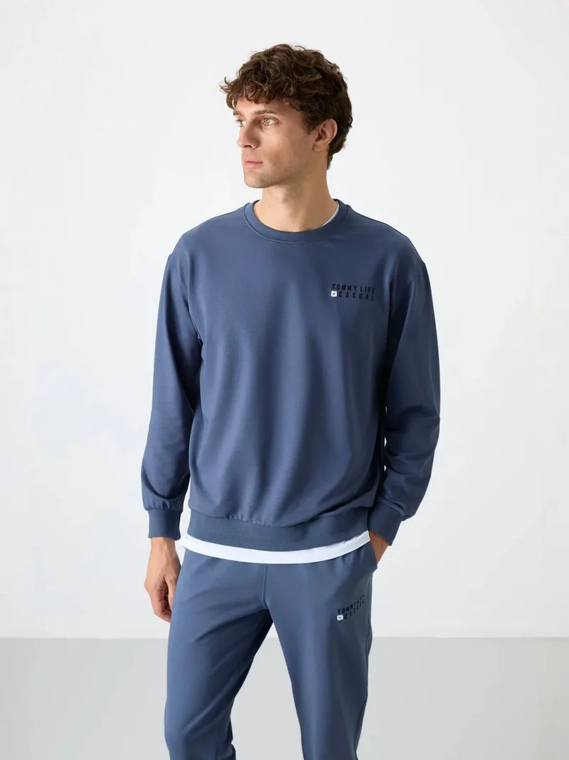 تومي لايف TOMMY Men's Oversized Sweatshirt And Pants Set