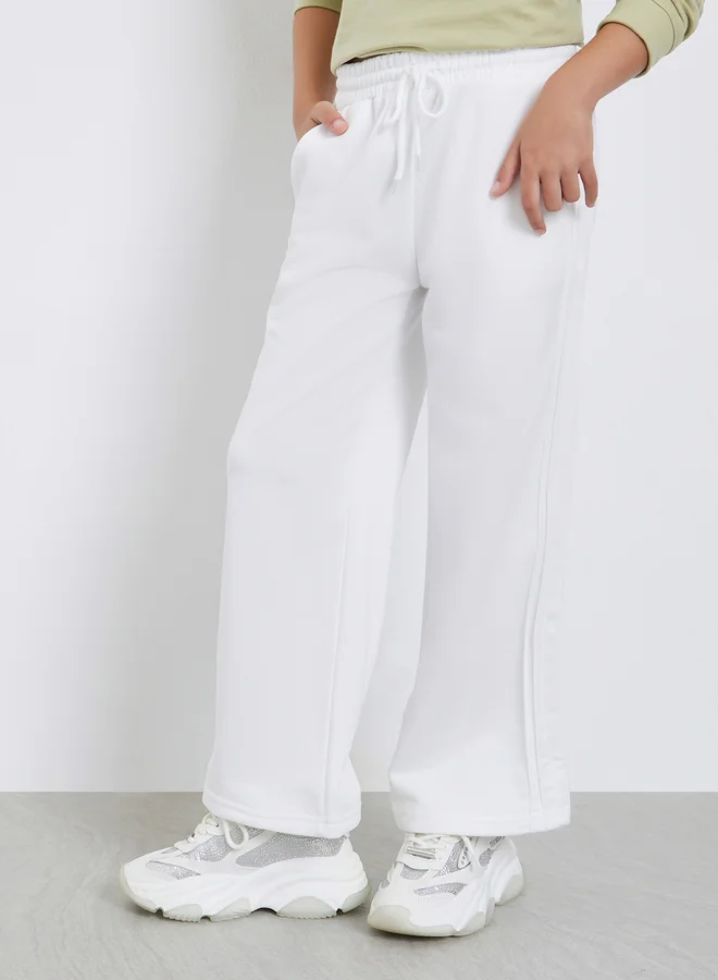 ستايلي جوغر واسع سادة بتفاصيل جانبية مطوية