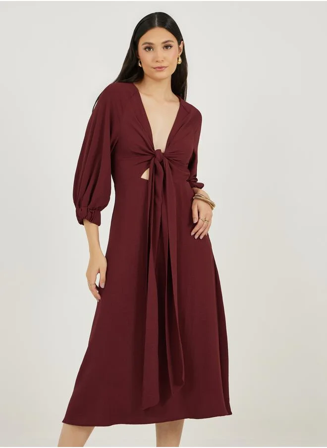 ستايلي Deep V Neck A-Line Midi Dress with Tie Up Detail