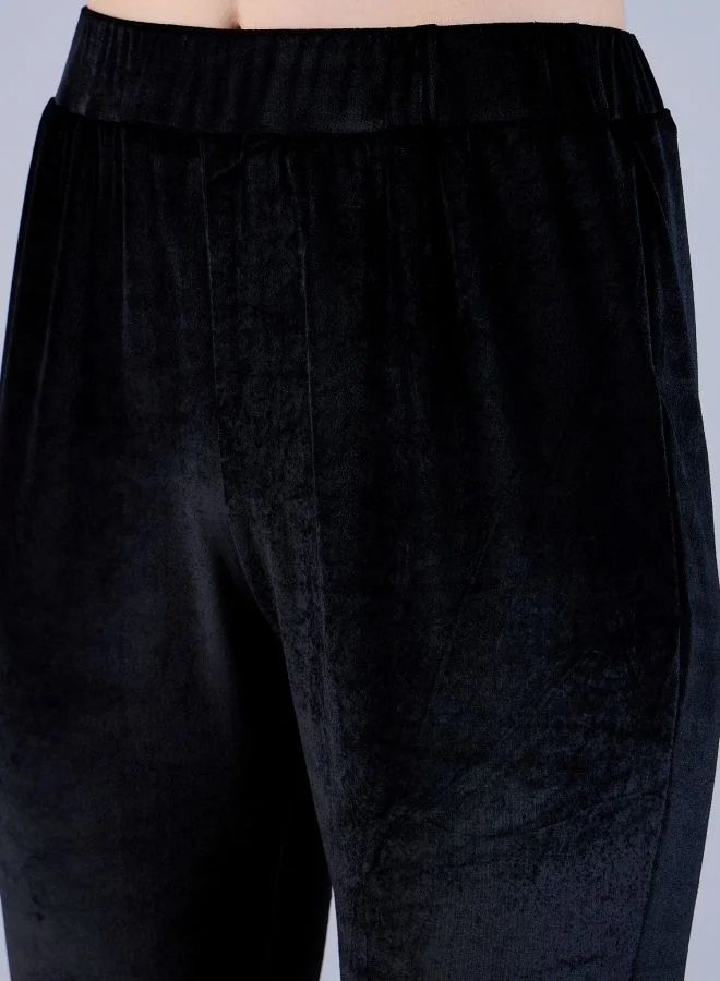مرفوعة Women Regular Fit Solid Mid-Rise Bootcut Trousers