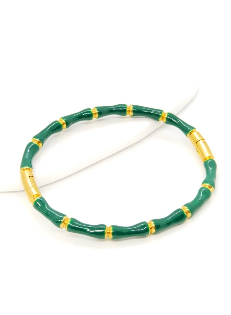 ذا بلاك بيرل اكسسوريز أسورة أستانليس ستيل ذهبي أخضر - Image 1