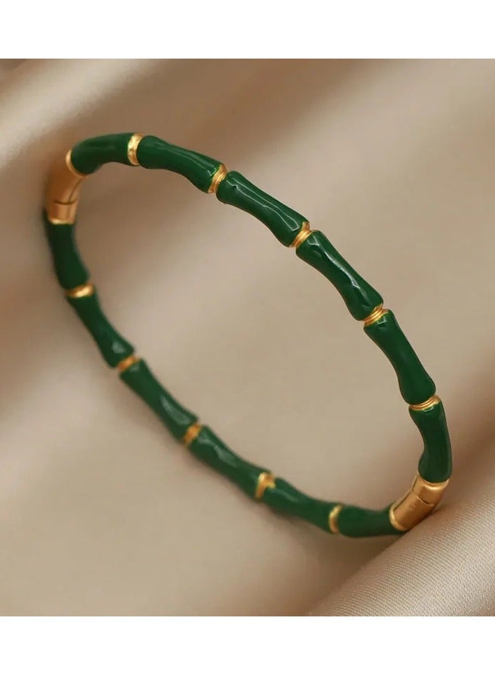 ذا بلاك بيرل اكسسوريز أسورة أستانليس ستيل ذهبي أخضر - Image 3