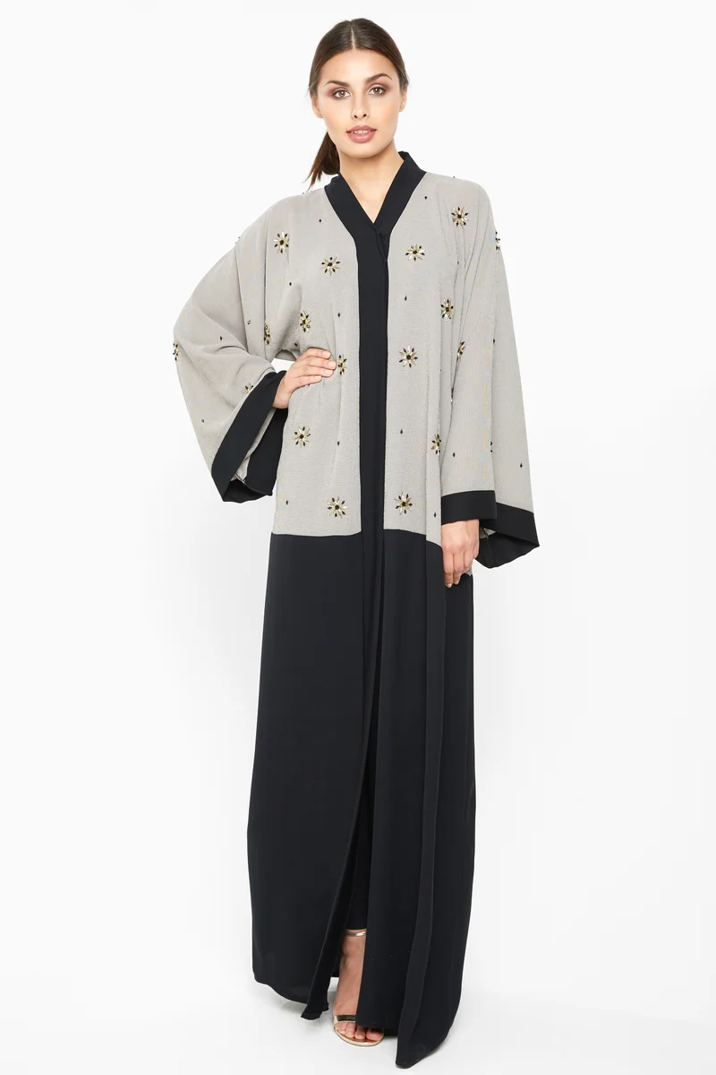 النخبة A classic duo-colored abaya with floral pearl and sequin embroidery detailing-AJ670A