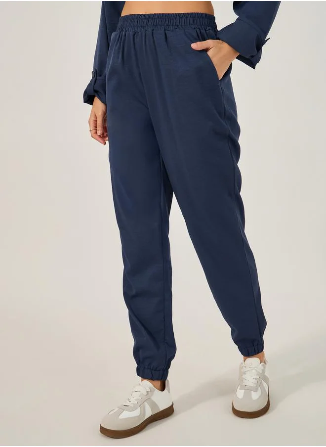 ستايلي Solid Button Down Shirt and Jogger Set with belt detail