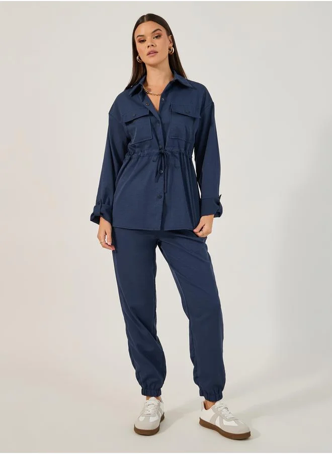 ستايلي Styli Solid Button Down Shirt and Jogger Set with belt detail