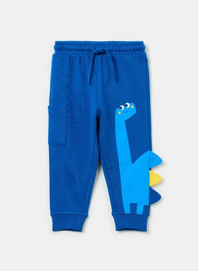 او في اس Joggers with dinosaurs print and application