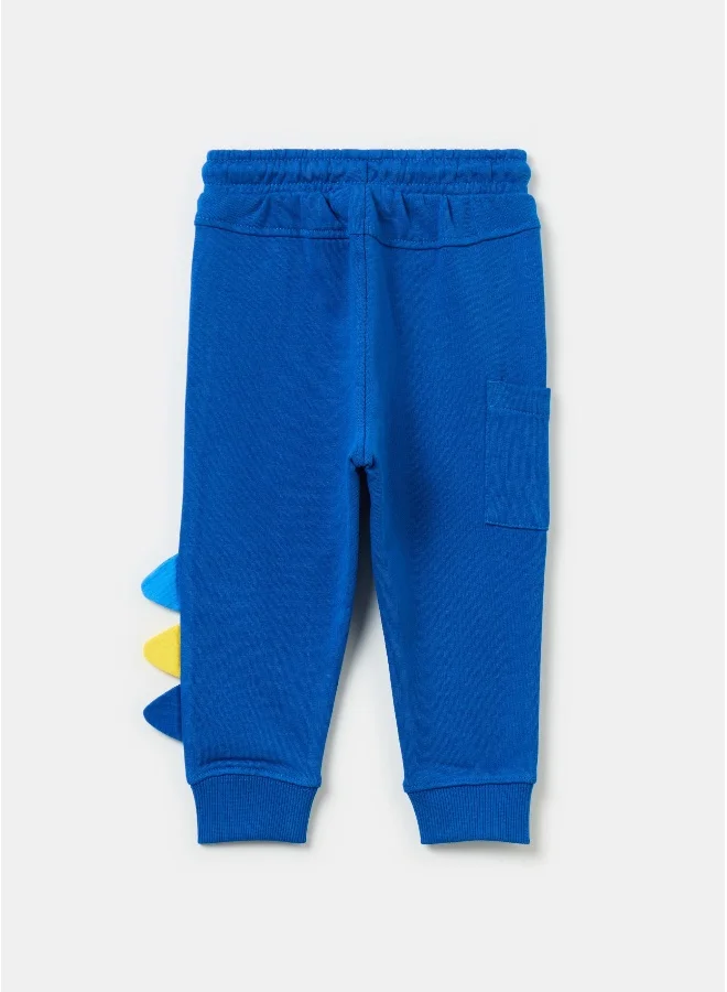 او في اس Joggers with dinosaurs print and application