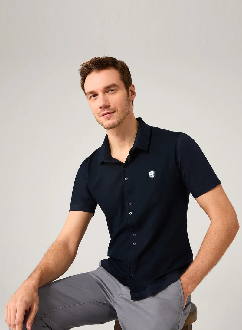 Theodore  The Jacquard Hybrid Polo Shirt for Men | Best Price UAE