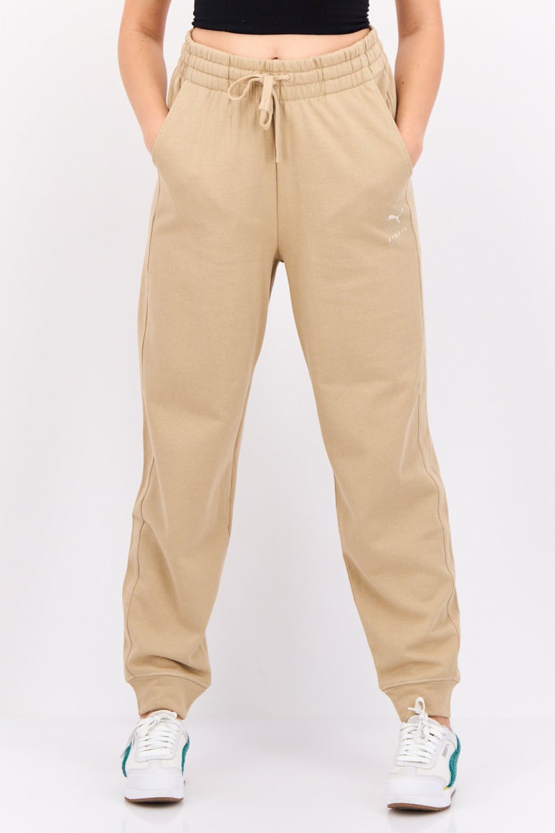 PUMA Women Comfort Fit Outdoor Sweatpants, Tan  - Image 1