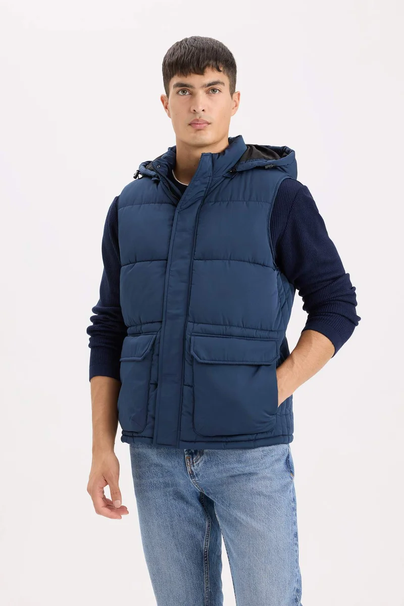 Defacto  Regular Fit Hooded Zippered Pocket Puffer Vest for Men | Best Price UAE