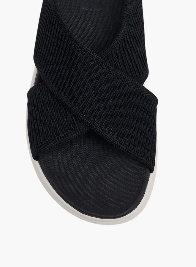 فلورا بيلا من شو إكسبرس Cross Strap Flatform Sandals with Hook and Loop Closure