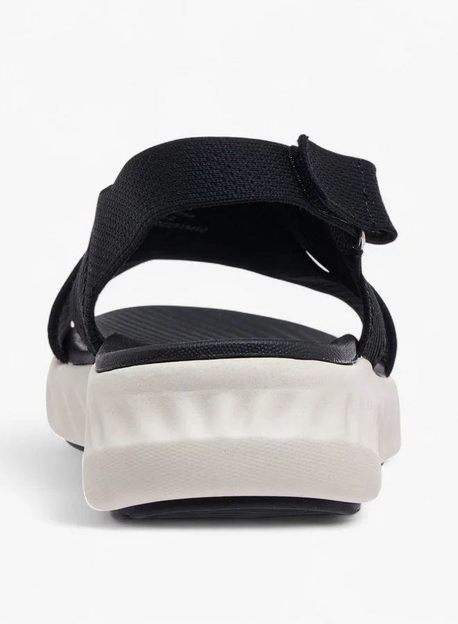 فلورا بيلا من شو إكسبرس Cross Strap Flatform Sandals with Hook and Loop Closure