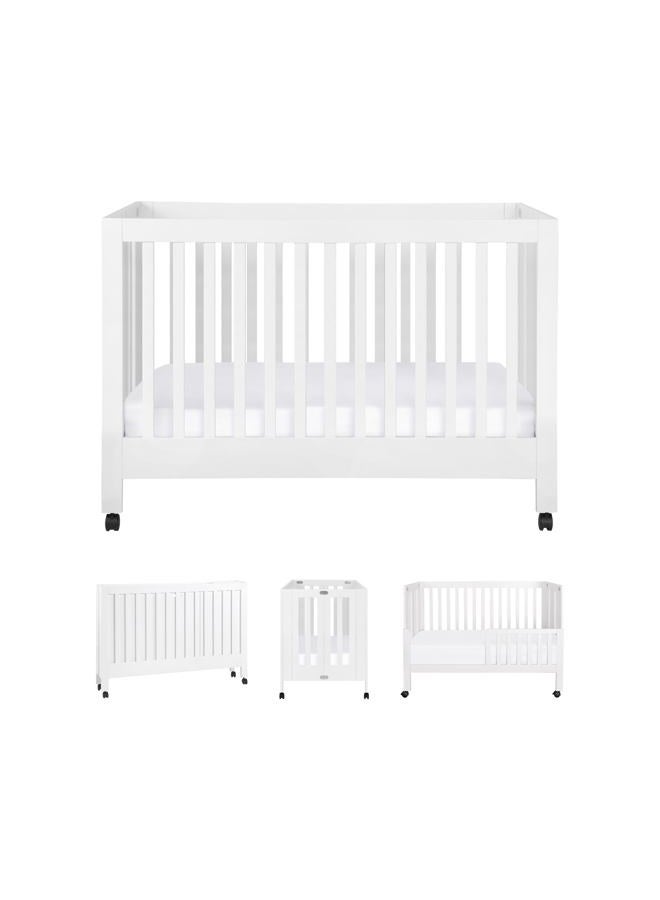 Babyletto Maki Full-Size Portable Folding Crib with Toddler Bed Conversion Kit in White, Greenguard Gold Certified - Image 1